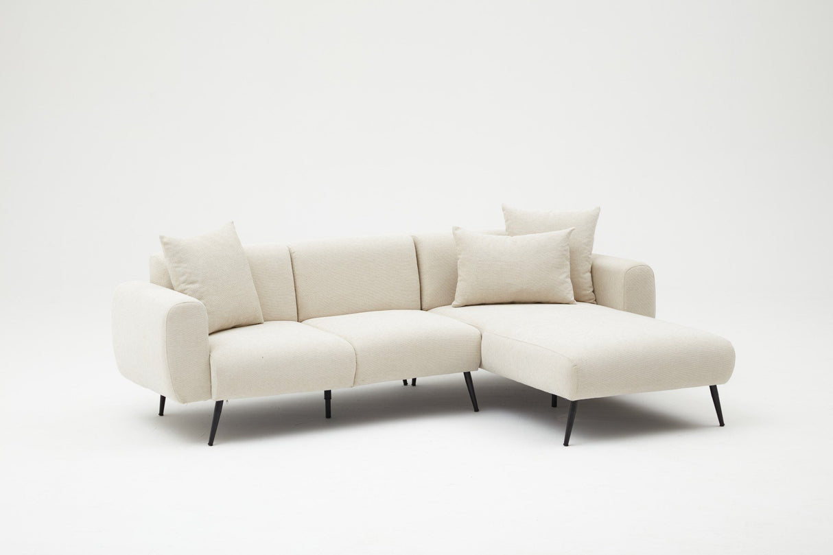 Canapé d'angle tissu crème - Pieds hauts fins - Intérieur uni - 252 x 155 cm - Côté