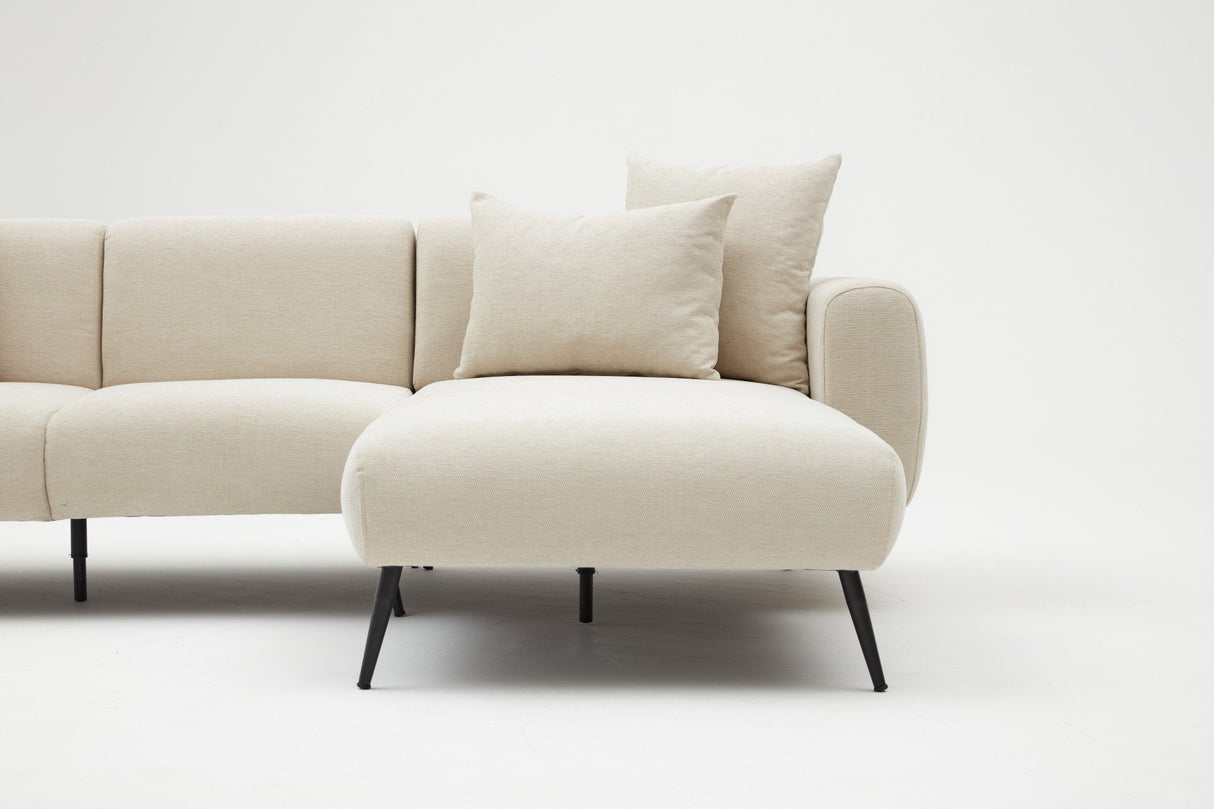 Canapé d'angle tissu crème - Pieds hauts fins - Intérieur uni - 252 x 155 cm - Côté