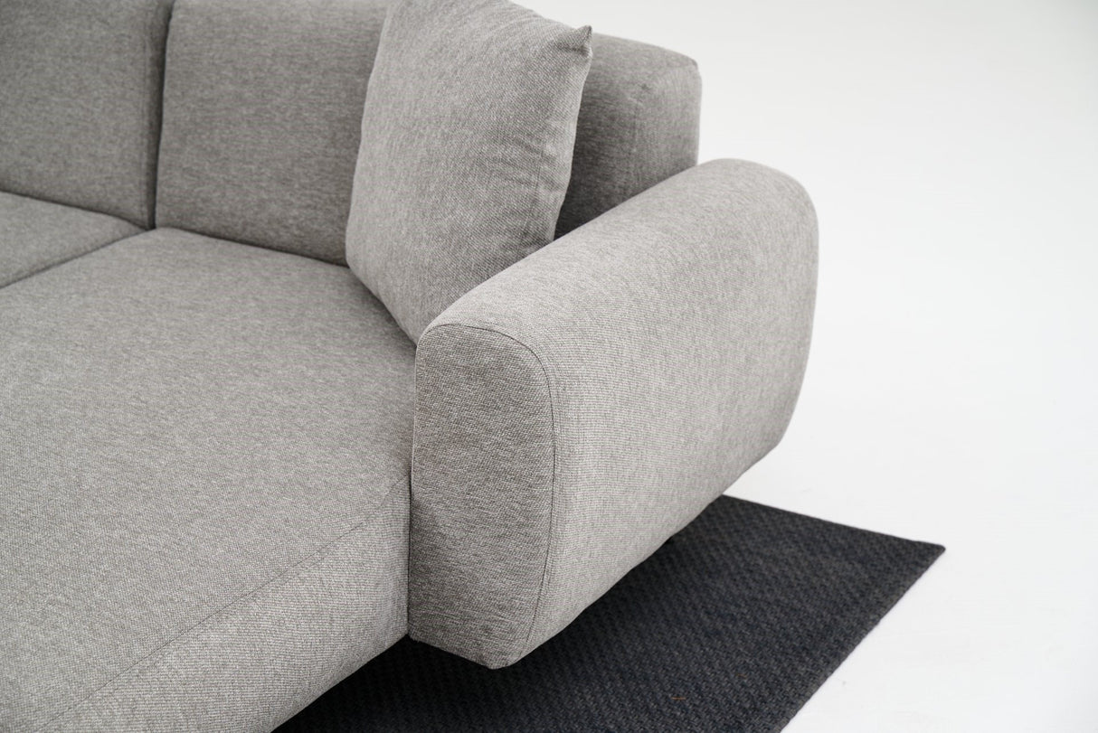 Canapé d'angle tissu gris - Pieds hauts fins - Intérieur uni - 252 x 155 cm - Côté