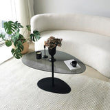 Table basse design organique en verre teinté Torpo - cadre en métal noir 