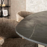 Table ovale en bois de cerf Iris 140x80 cm avec pied en étoile aspect céramique 