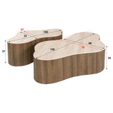 Photo blanche cotée lot de 2 tables basses organiques Cruz Grand avec plateaux en céramique travertin et piètement nervuré aspect bois de chêne.