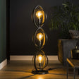 Lampadaire Otan DH Intérieur Charbon LxlxH 128x45x36 Métal Photo d'ambiance vue de face diagonale