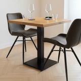 Table de bistrot Bois de manguier Photo d'ambiance carrée dans un intérieur moderne