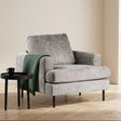 Fauteuil Faya en tissu beige photo d'ambiance dans un intérieur moderne