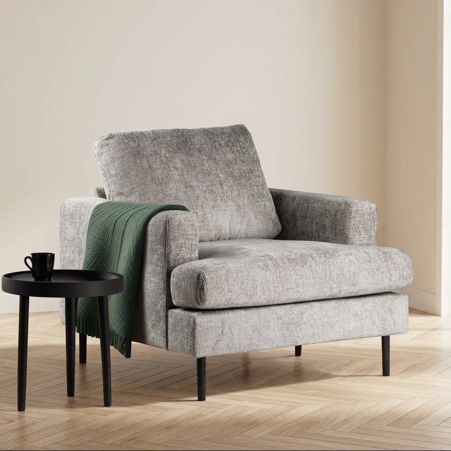 Fauteuil Faya en tissu beige photo d'ambiance dans un intérieur moderne