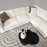 Canapé d’angle Gavi en tissu côtelé ultra doux crème – méridienne à droite