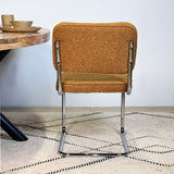 Chaise de salle à manger moderne en tissu bouclé cuivre Sway - cadre en chrome - sans accoudoirs 