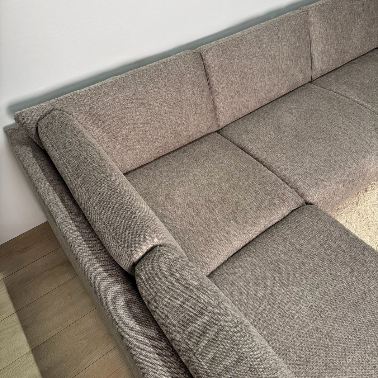 Canapé d'angle moderne U-Bank gauche en tissu taupe Aniko 310x197x78 cm 